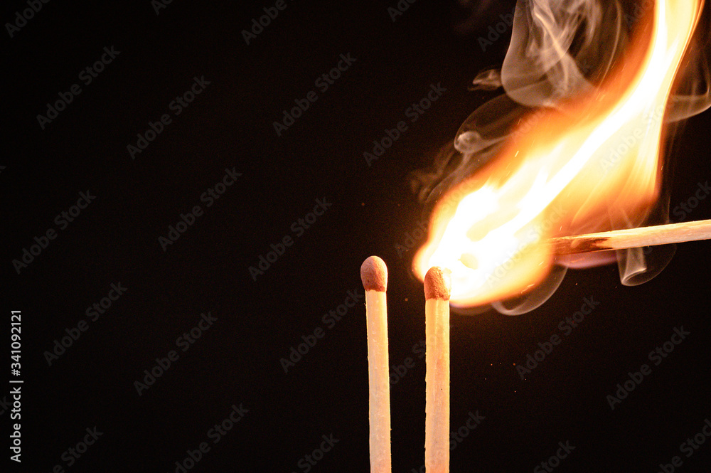 Burning flame to a matchstick Burning flame to a matchstick