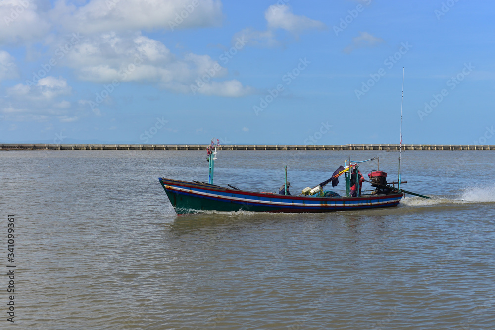 Fishing boat on the sea and blue sky of Thailand