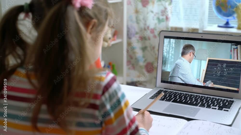 Middle-aged man distance teacher online tutor conferencing on laptop communicate with pupil by webcam video call e-learning. Home quarantine distance learning and working at home.