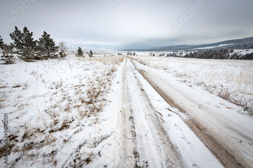 Tazhenranskaya steppe on the coast of the Baikal Lake in winter - Siberia, Russia photo