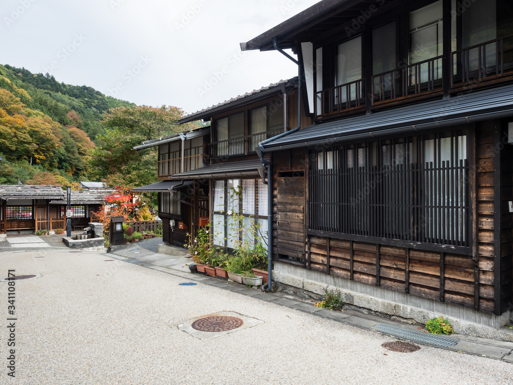 Traditional houses in historic district of Kiso-Fukushima, an old post town along Nakasendo road - Nagano prefecture, Japan Traditional houses in historic district of Kiso-Fukushima, an old post town along Nakasendo road - Nagano prefecture, Japan