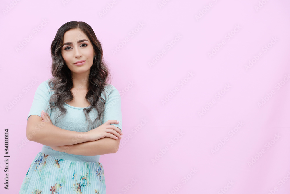 Young woman over isolated pink background crossed arms Young woman over isolated pink background crossed arms