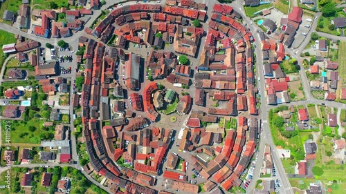 EGUISHEIM, FRANCE - CIRCA 2015: Stained glass of Saint Maternis and Saint Abrogate at Leo chapel, where relics of Pope St Leo IX are conserved