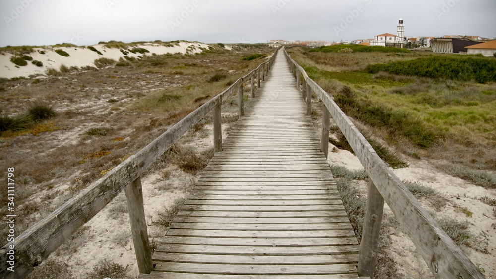 Pier over the dunes at the coast - travel photography
