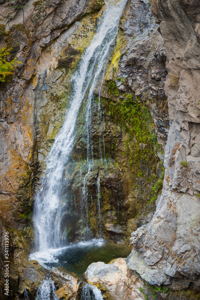Close-up of waterfall and pool in Short's Creek Gorge at Fintry Provincial Park, BC, Canada