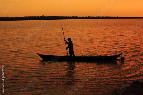 boat at sunset © Rifki