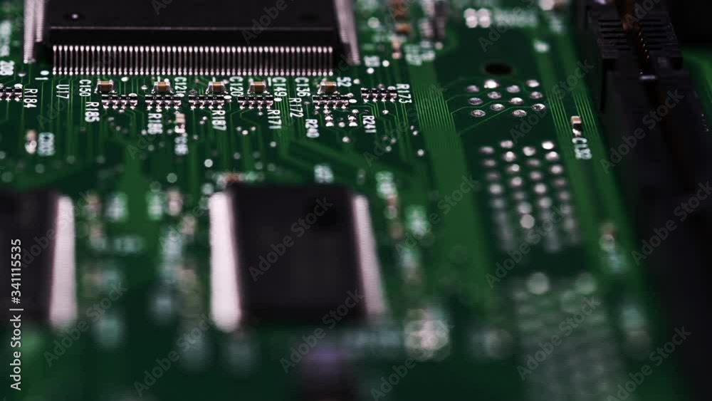 Green circuit board close up dolly shot