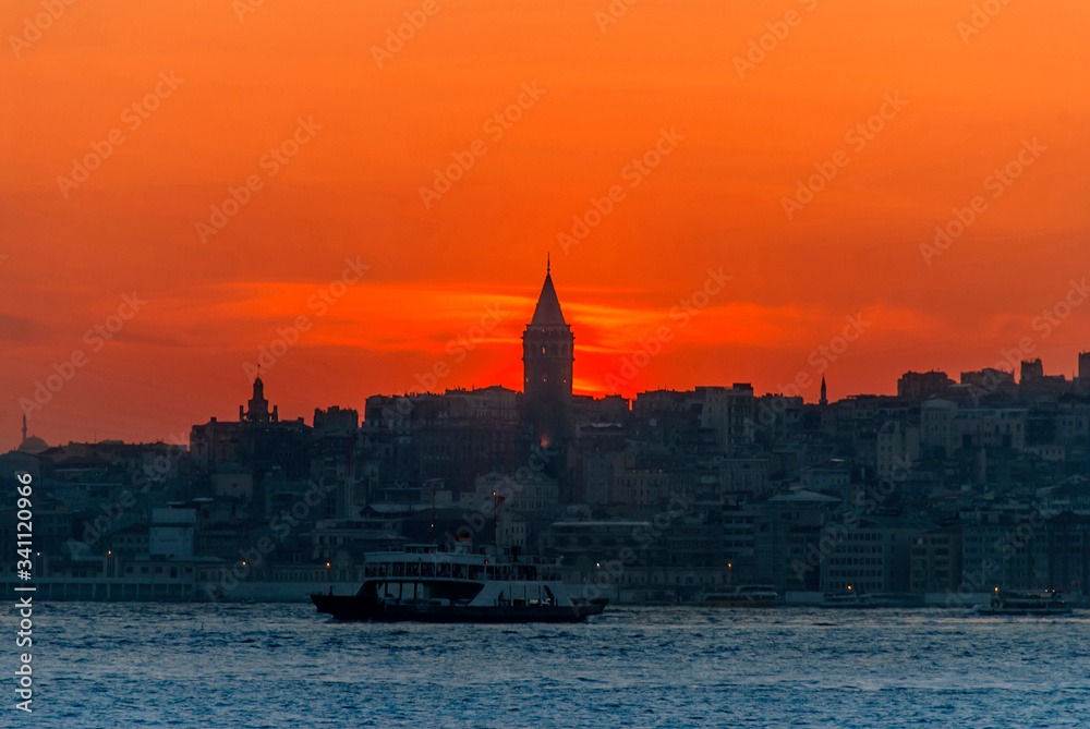 Beyoglu, Istanbul, Turkey, 17 April 2015: Galata Tower, King of Byzantine Anastasius, 528, Sunset.