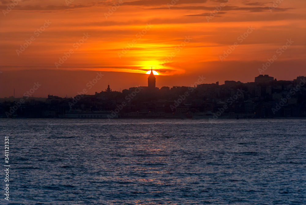 Beyoglu, Istanbul, Turkey, 24 May 2007: Galata Tower, King of Byzantine Anastasius, 528, Sunset.