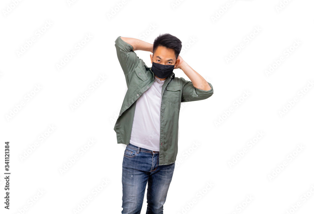 An Asian short hair man wears black mask. An Asian short hair man wears black mask.
