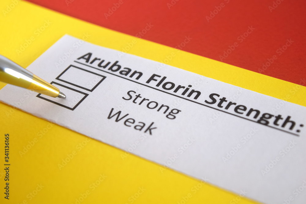 Obraz premium One person is answering question about strength of Aruban Florin.