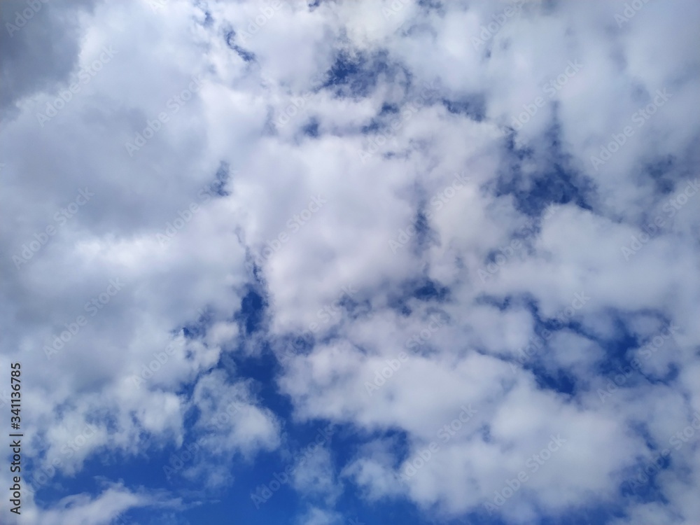 Obraz premium bright blue sky with clouds abstract background