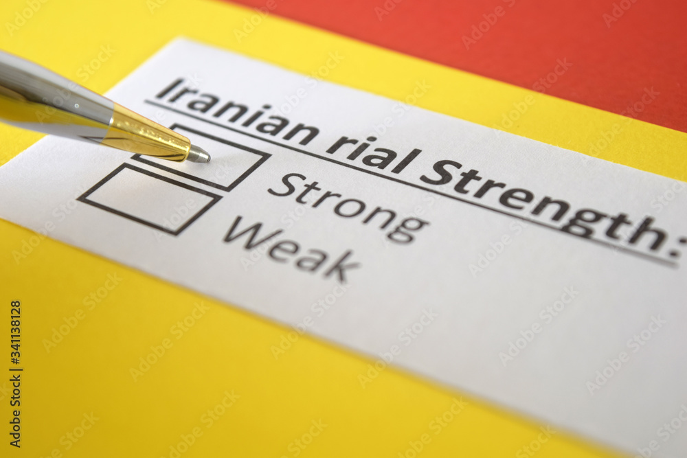 One person is answering question about strength of Iranian rial currency. One person is answering question about strength of Iranian rial currency.