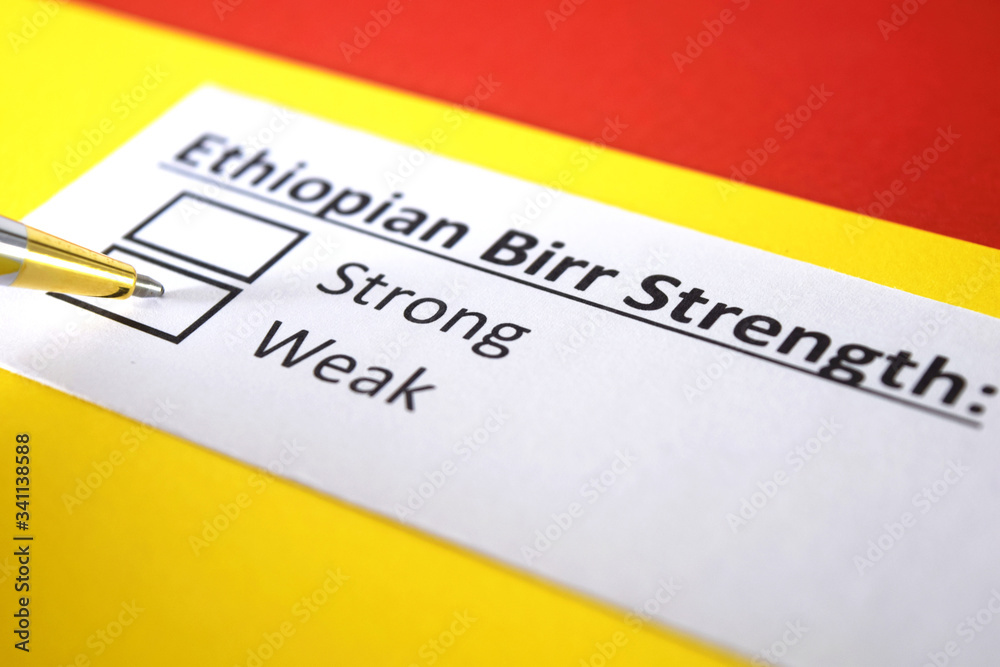 Fototapeta premium One person is answering question about strength of ethiopian, birr