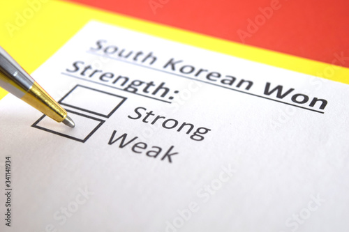 One person is answering question about strength of South Korean Won.
