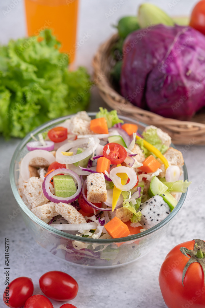 Vegetable and fruit salad on a white plate. Vegetable and fruit salad on a white plate.