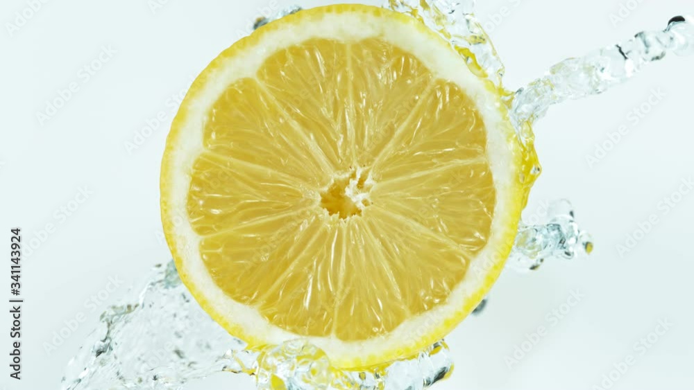 Super Slow Motion Shot of Lemon Fruit with Splashing Water Isolated on White Background at 1000fps. Super Slow Motion Shot of Lemon Fruit with Splashing Water Isolated on White Background at 1000fps.