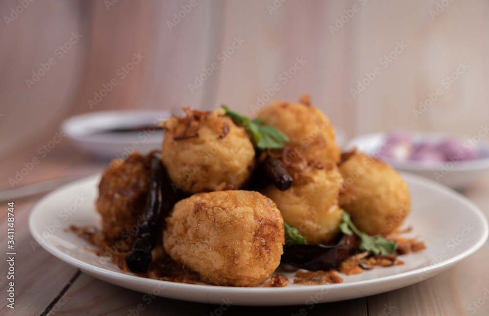 Boiled eggs stir-fried with tamarind sauce. Boiled eggs stir-fried with tamarind sauce.