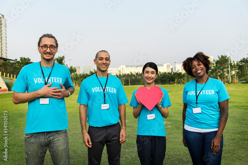 Group of happy and diverse volunteers