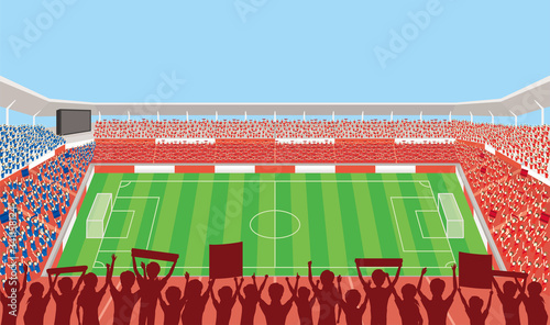 A football stadium packed with supporters.