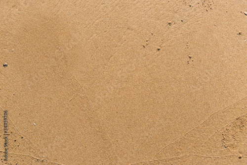 Fototapeta Flat sand on a beach textured backdrop