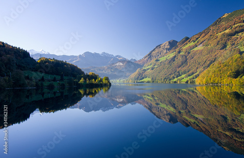Mirrored view of the Lungern lake in Switzerland.