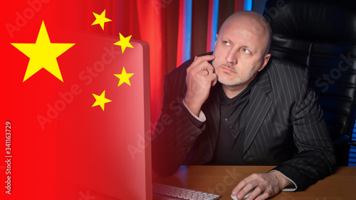 A businessman sits in his o...