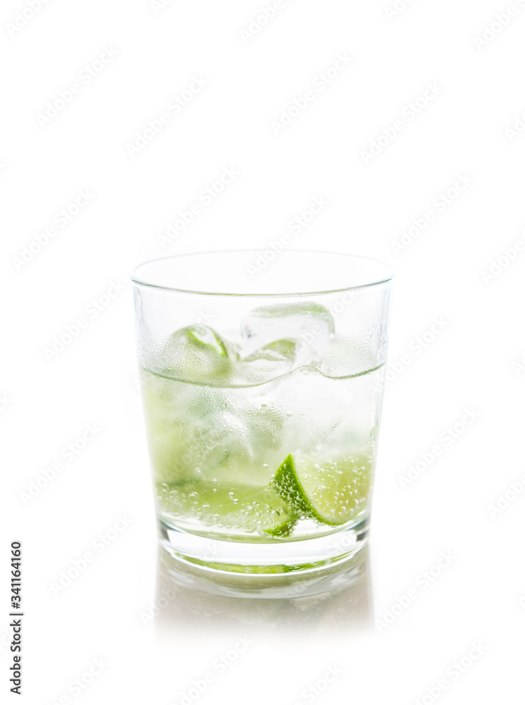 Rum based cocktail caipirinha (variation of cuba libre) on the white background. Selective focus. Shallow depth of field.
Rum based cocktail caipirinha (variation of cuba libre) on the white background. Selective focus. Shallow depth of field.