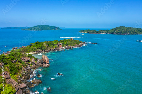 Aerial view of people swimming on the sea and beach on Gam Ghi Phu Quoc island in Thailand bay, Kien Giang, Vietnam.