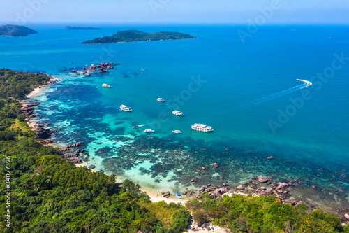 Aerial view of people swimming on the sea and beach on Gam Ghi Phu Quoc islan...