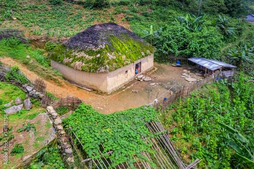 Aerial view of Trinh Tuong house or house made of land of ethnic minorities in Y Ty, Lao Cai, Vietnam. This is the traditional house of Ha Nhi people. photo