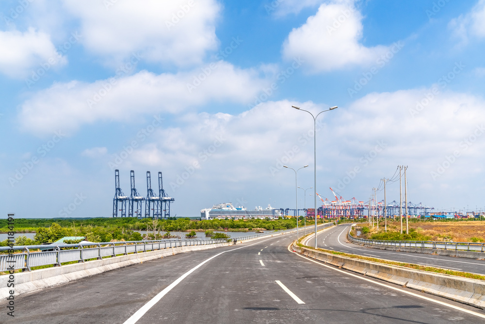 Top view aerial of International  container port Tan Cang - Cai Mep. Ba Ria, Vung Tau, Vietnam. Connect to Ho Chi Minh City by Thi Vai river and national road 51, near Can Gio. 