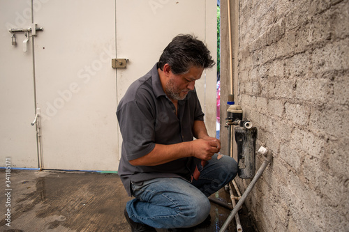 Man fixing a tube