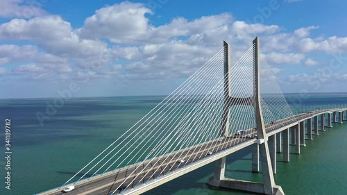 Vasco da Gama Bridge in Lisbon is a famous landmark in the city - aerial drone footage