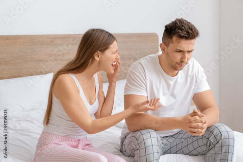 Young couple quarreling in ...