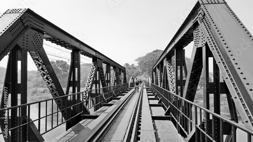 The bridge on the river kwai was built during world war 2, is important place, with a destination for tourists from around the world Thailand, vintage image.