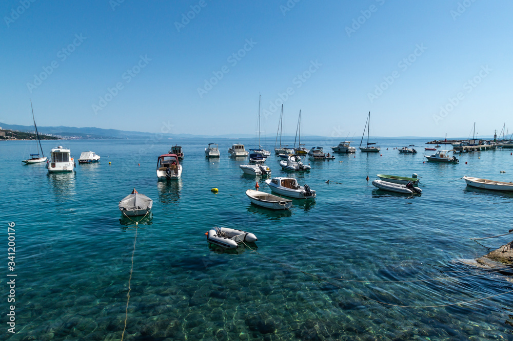 Obraz premium Boats on the water off the coast of Volosko, Croatia.