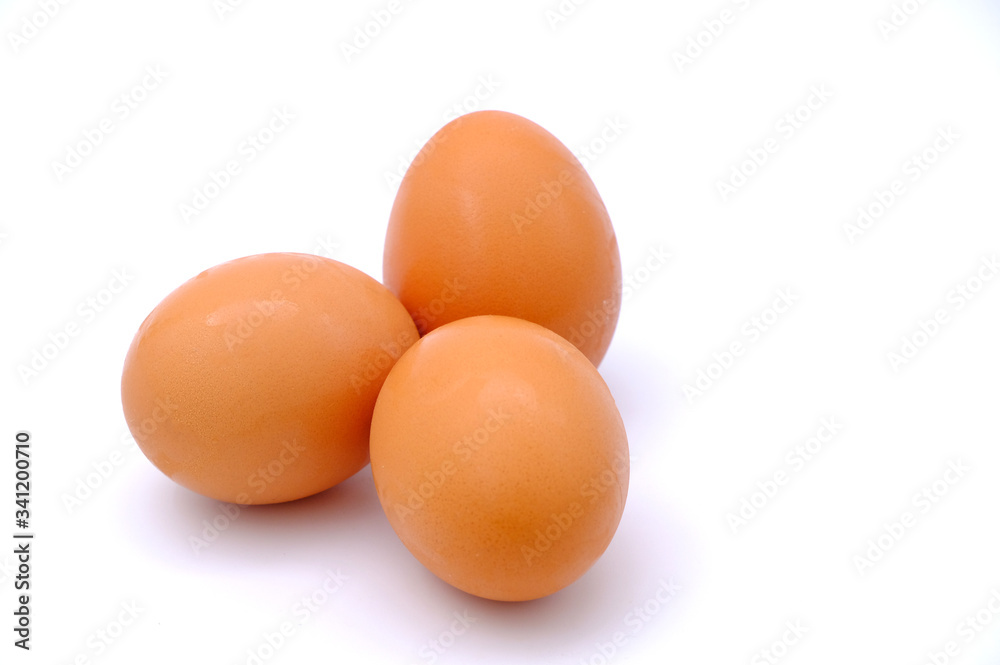 Close-up view of raw chicken eggs on background Close-up view of raw chicken eggs on background