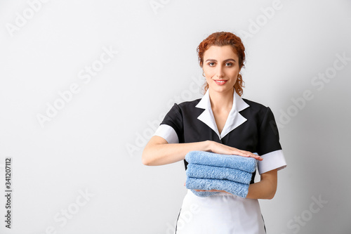 Beautiful young chambermaid...
