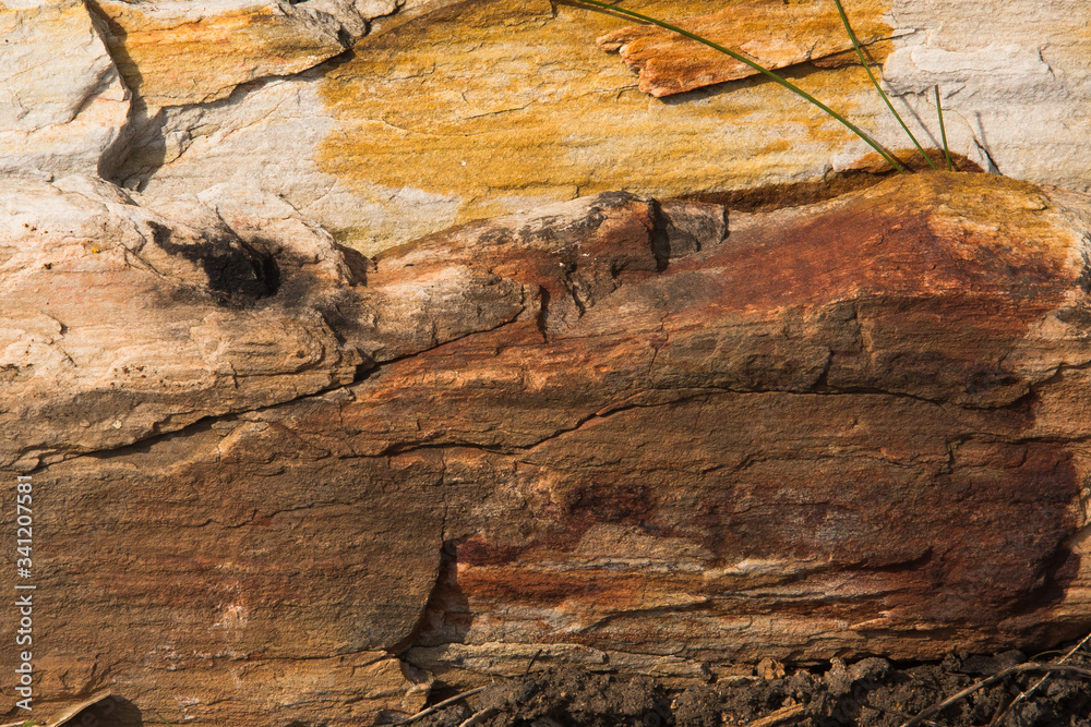 Texture of old ocher color stone Texture of old ocher color stone