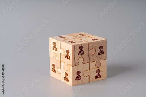 Business & HR icon on wood jigsaw puzzle cube