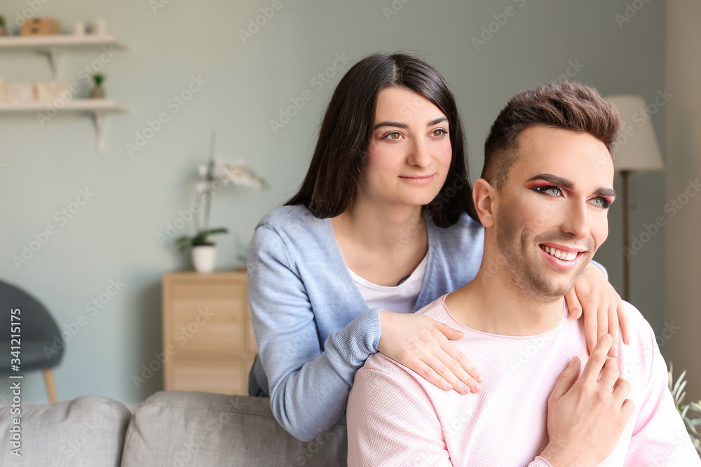 Portrait of happy transgender couple at home Portrait of happy transgender couple at home