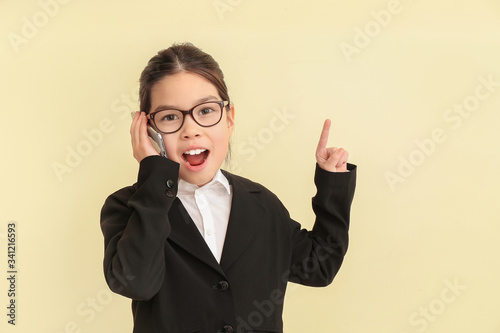 Cute little businesswoman t...