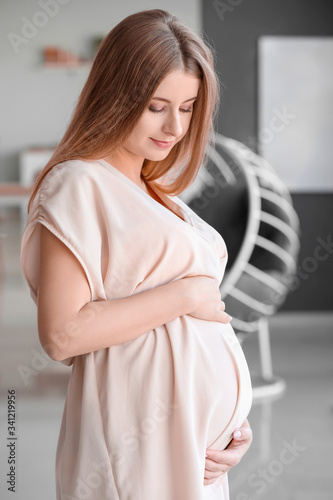 Beautiful young pregnant wo...