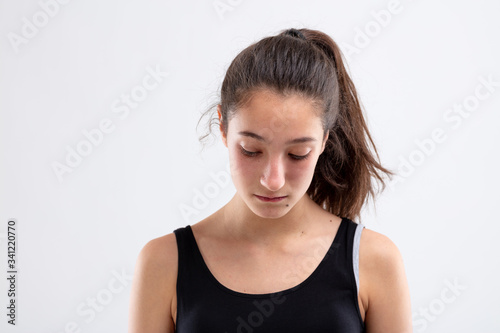 Depressed young woman looking down