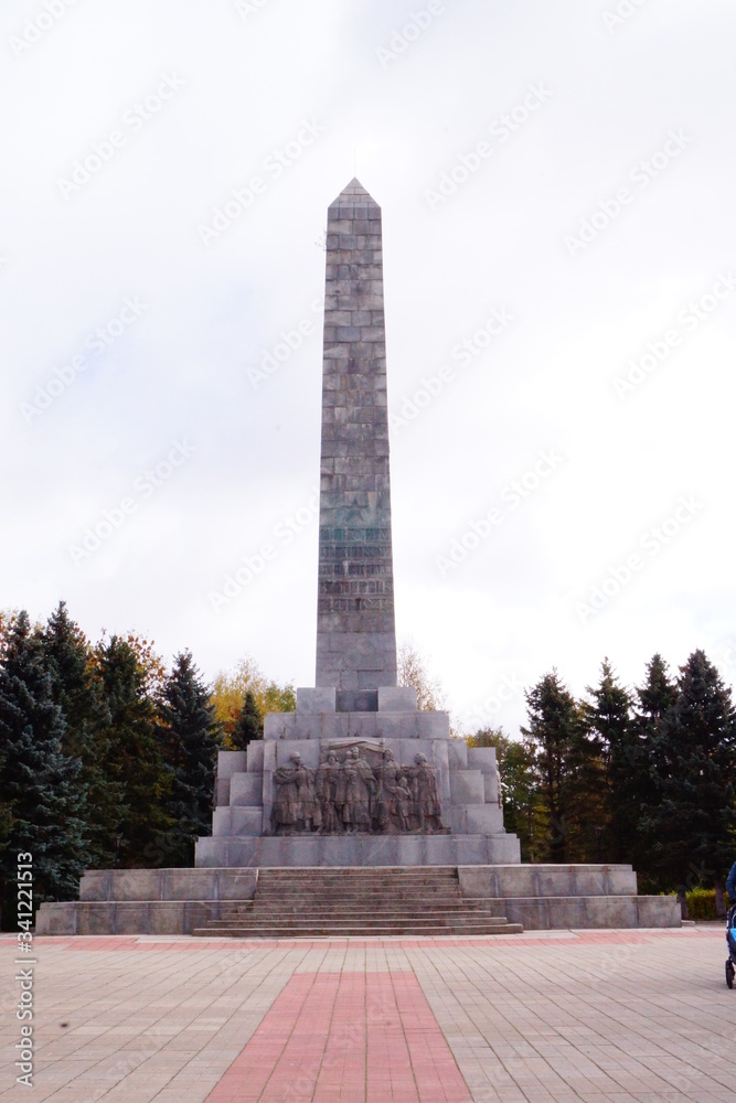The monument shows bas-reliefs celebrating the heroics of the World War II