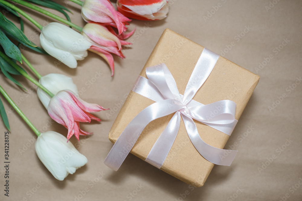 Gift box and flowers. Romantic colorful present. Gift box and flowers. Romantic colorful present.