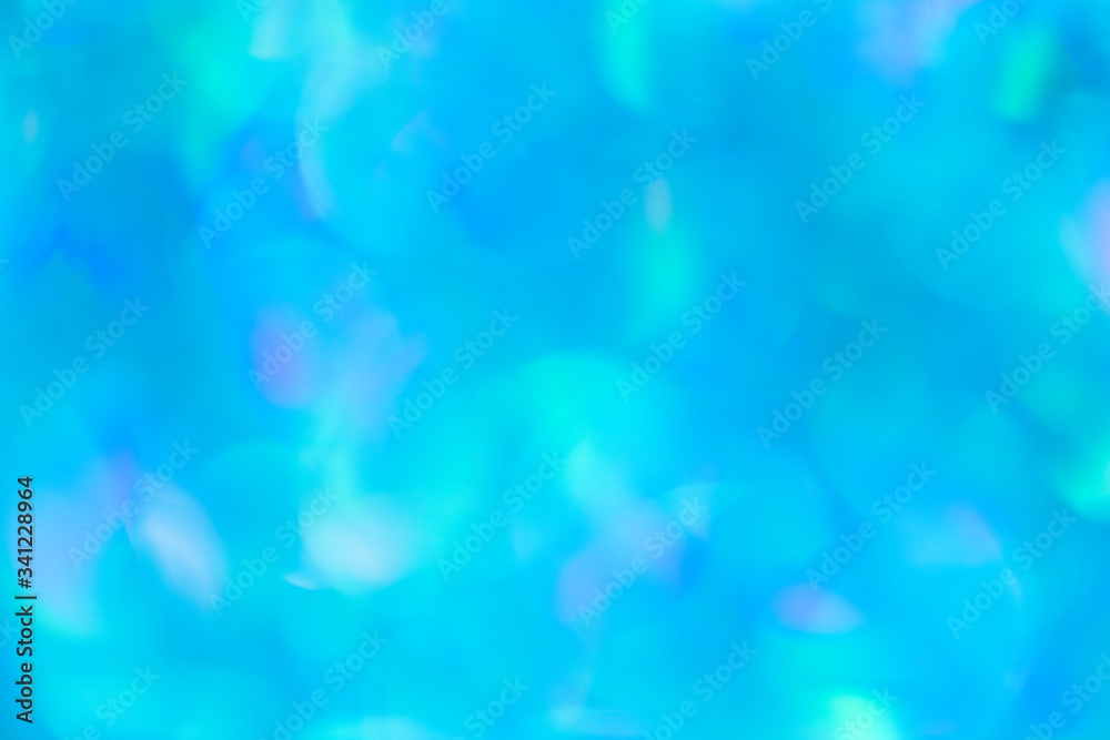 Abstract bright blue bokeh background