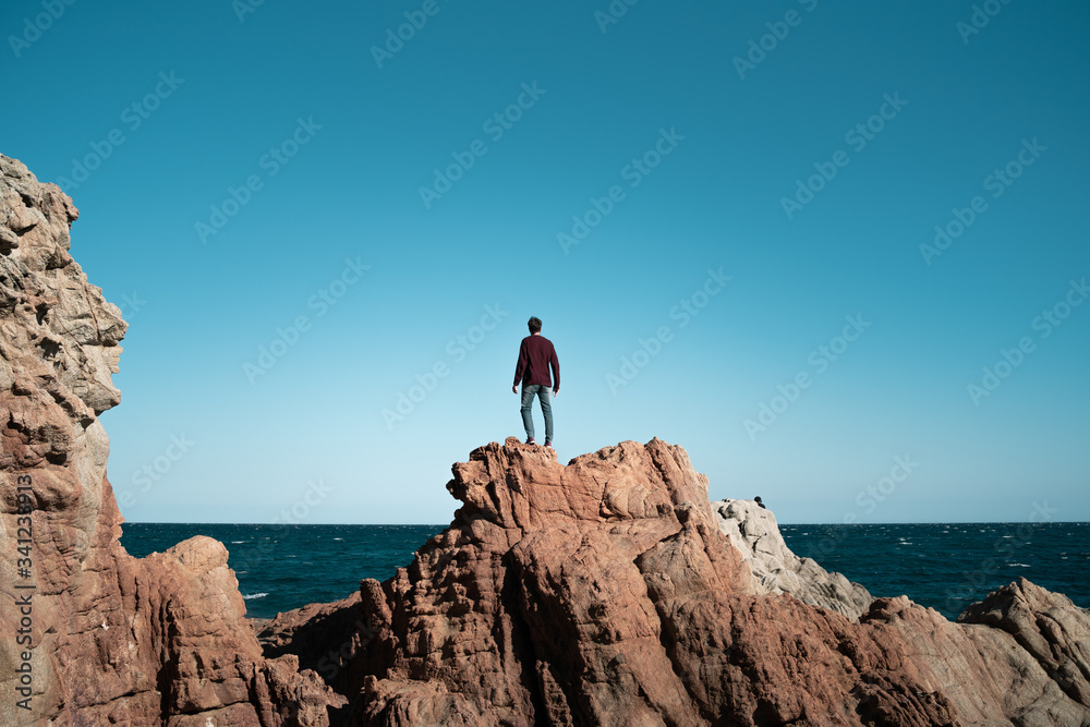 man on rocks  beach