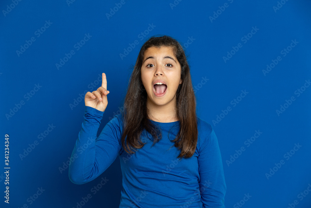 Brunette young woman wearing a yellow T-shirt Brunette young woman wearing a yellow T-shirt